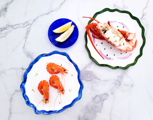 Seafood on plates, dinnerware and tableware for any occasion. Unique hand made and hand painted plates add a layer of sophistication and luxury to your dining table 
